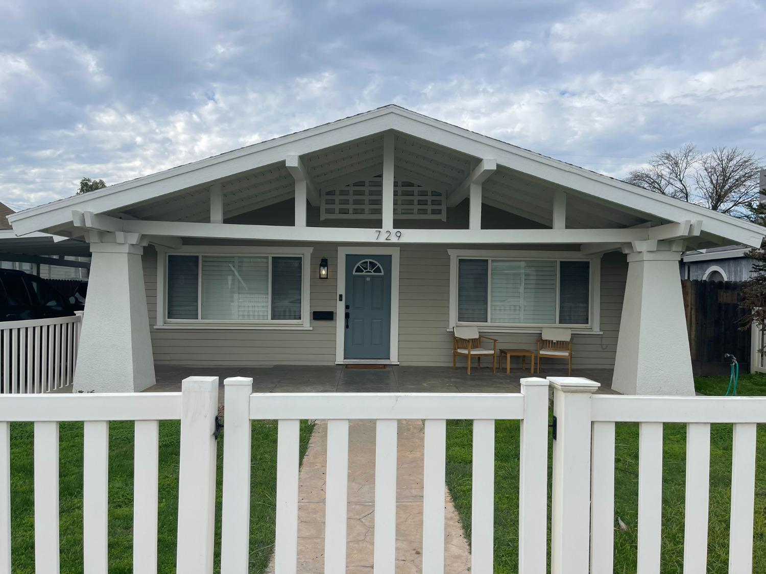 a front view of a house with a porch