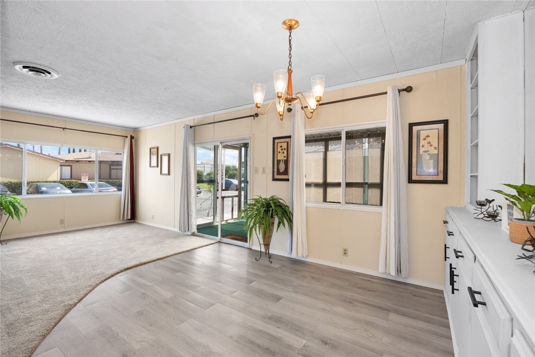 a view of livingroom with furniture and floor to ceiling window