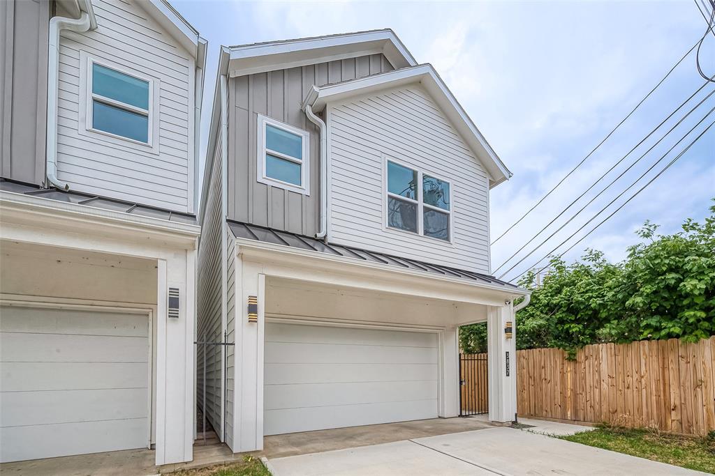 a front view of a house with a garage