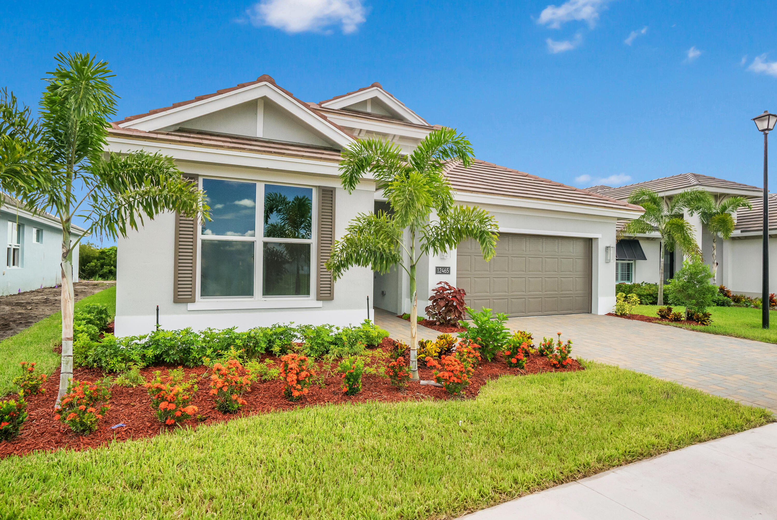 front view of a house with a yard