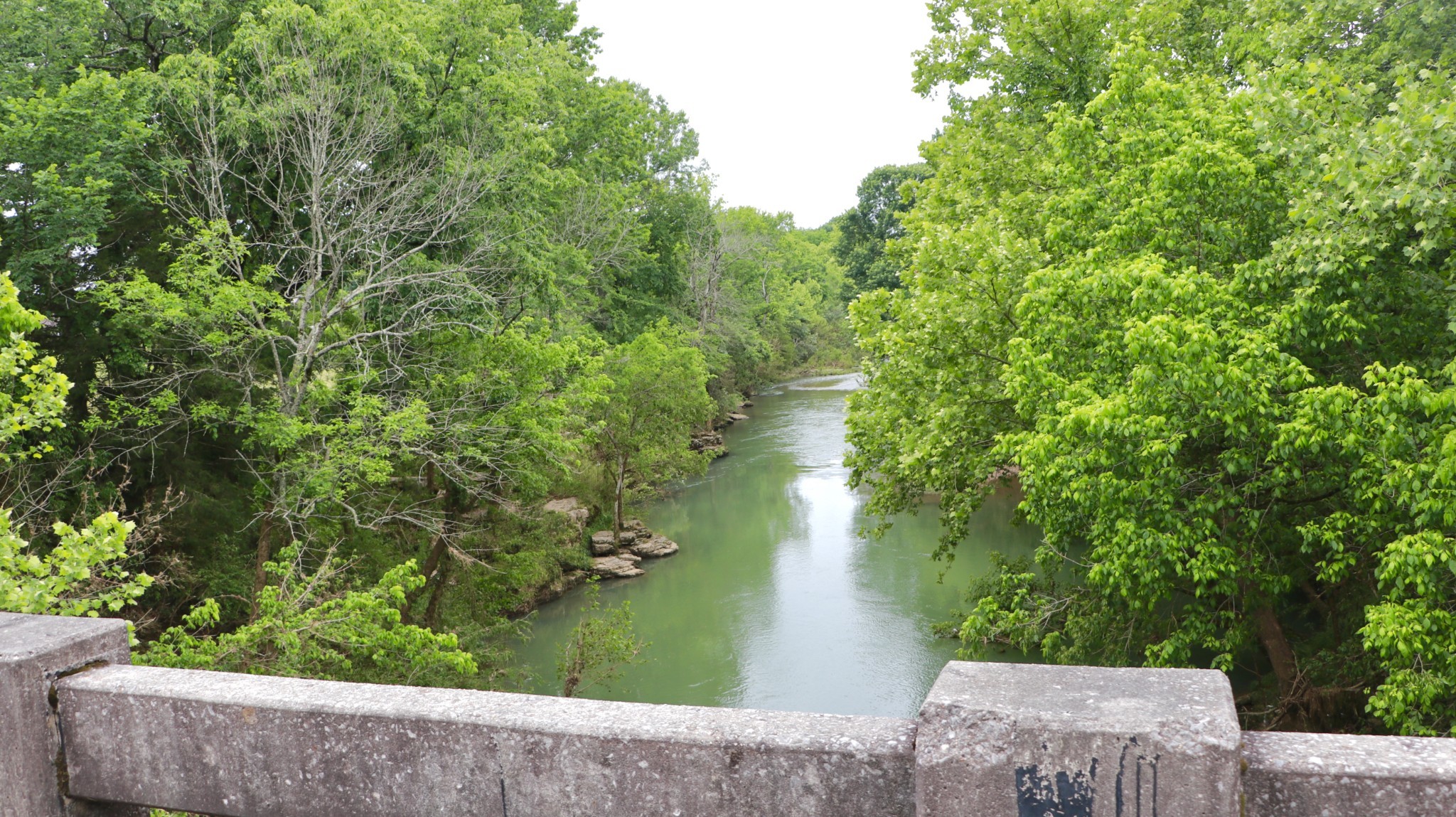 a view of a lake from a balcony