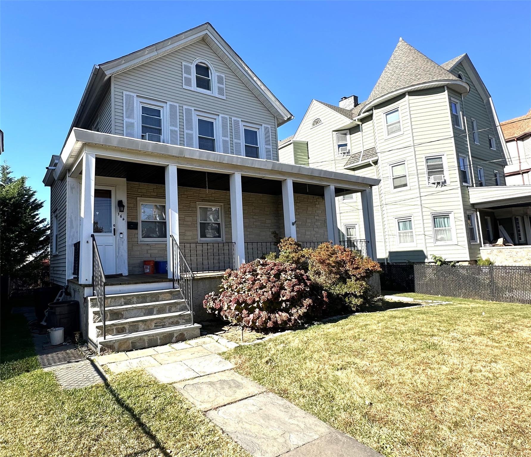 Lovely home with curb appeal and charming porch