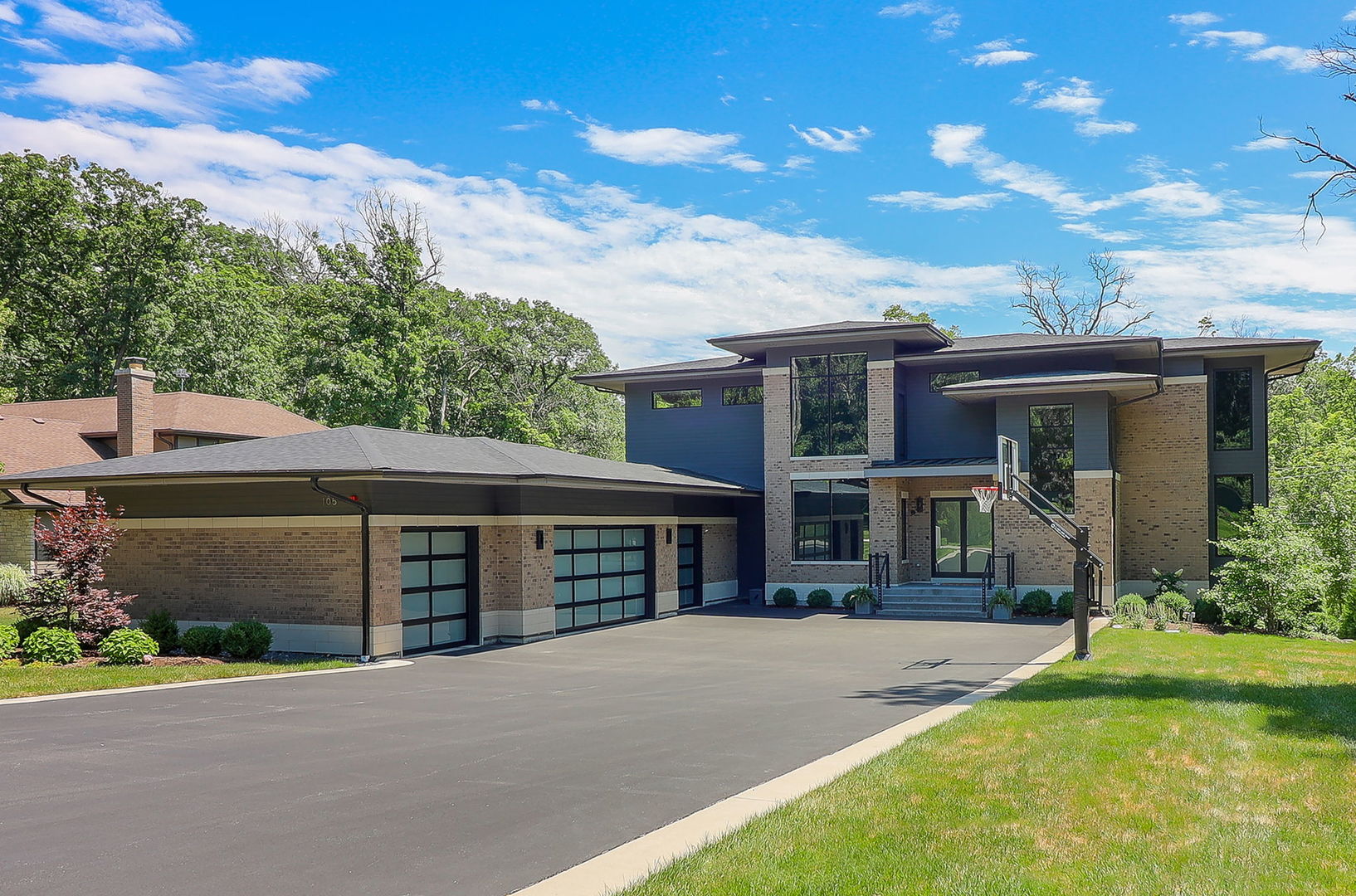 front view of a house with a yard