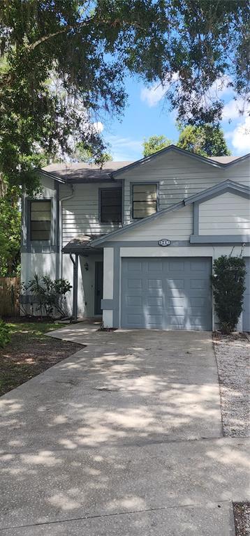 front view of a house with a garage