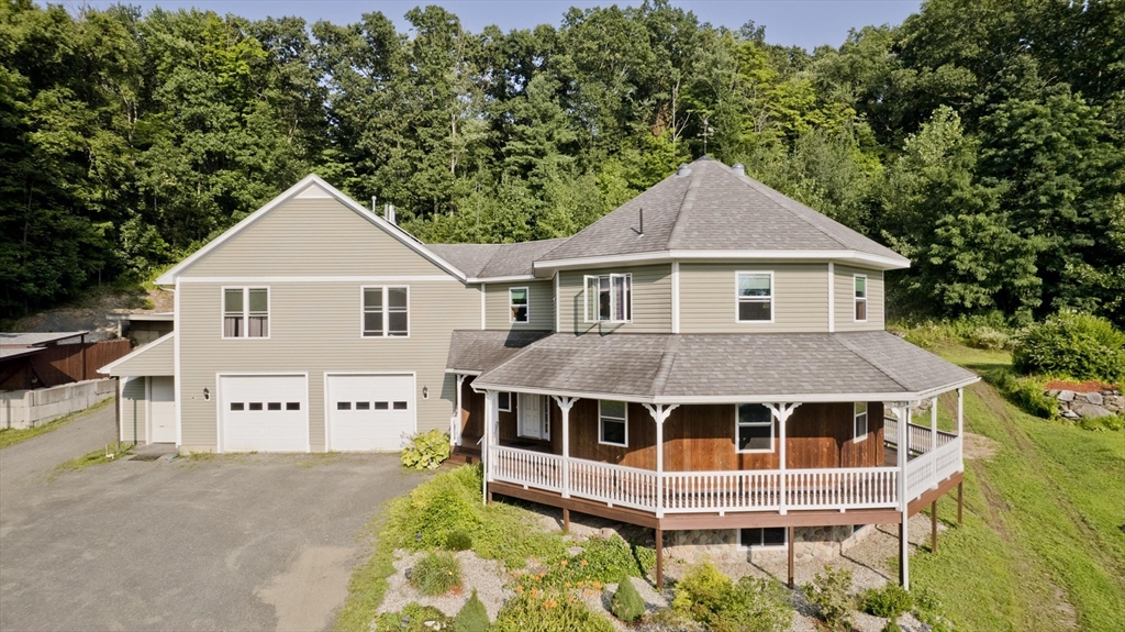 a house view with a garden space