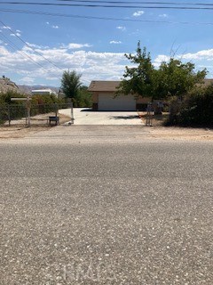 a view of street with a yard