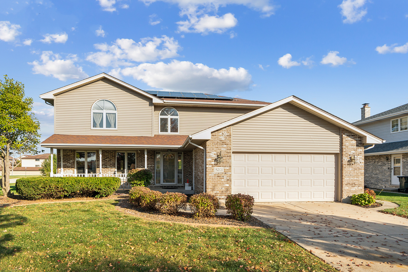 a view of a house with a patio