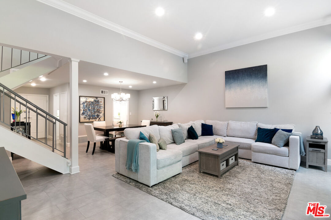 a living room with furniture and a couch