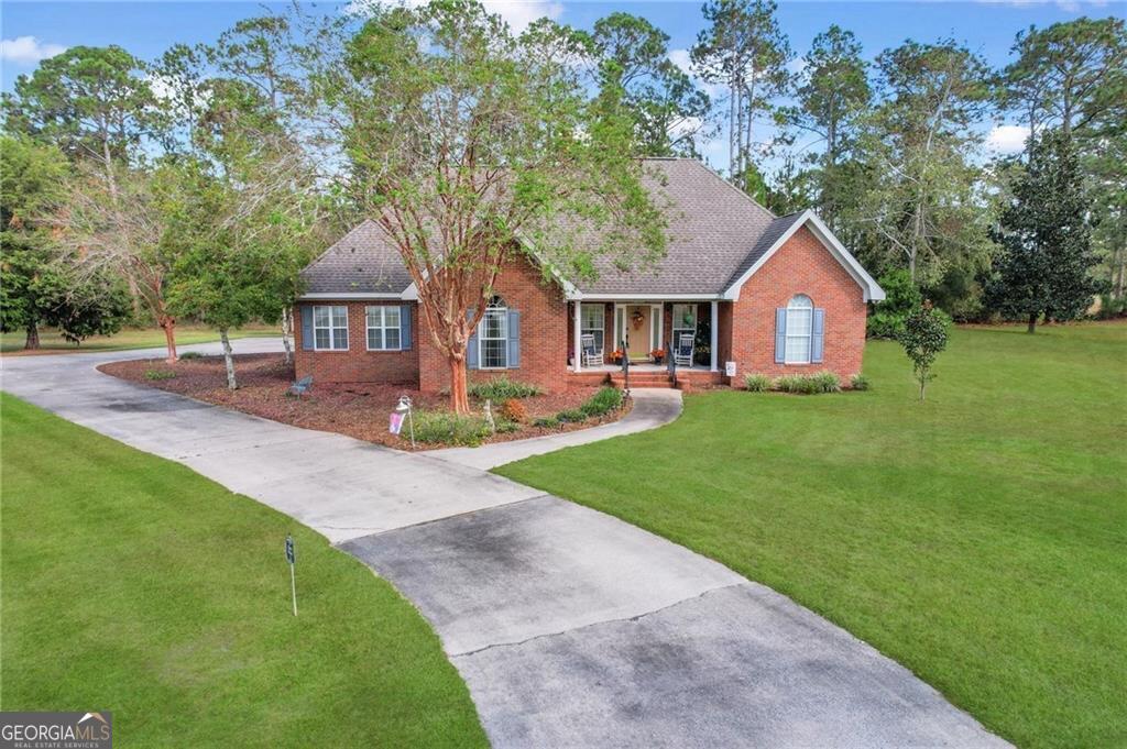 front view of a house with a yard