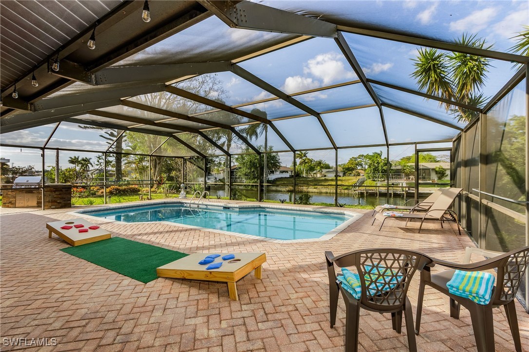 a view of a swimming pool with a patio