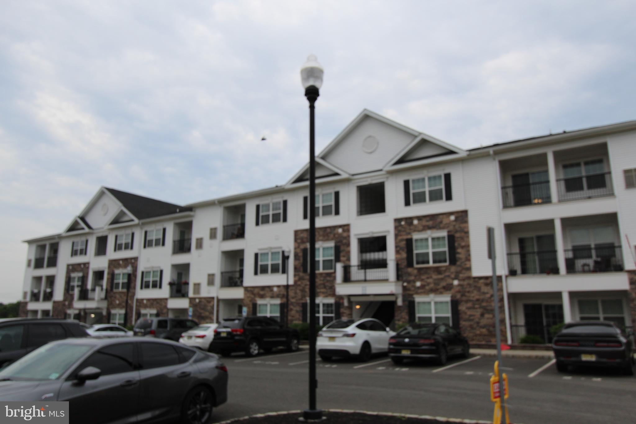 a front view of a building with street view