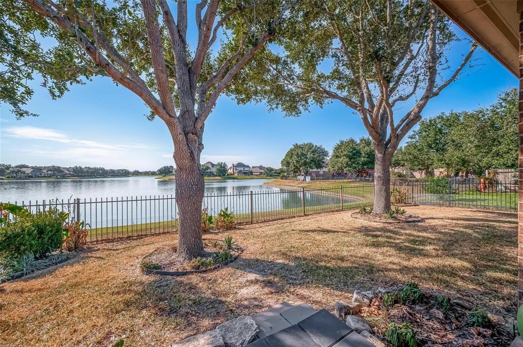 a lake view with a fountain