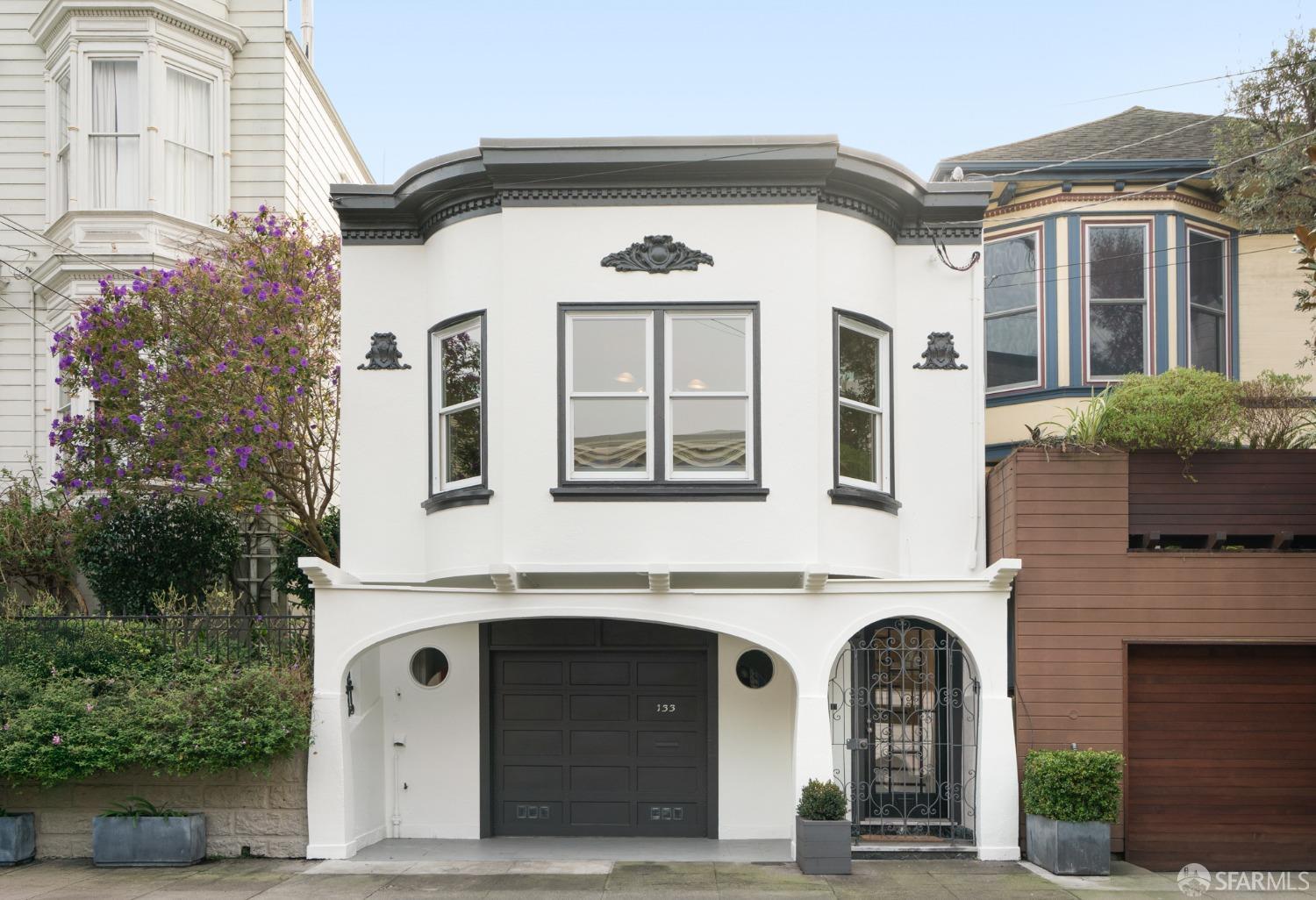 Classic Marina-style home on an extra deep lot in a prime Eureka Valley location, just blocks to Dolores Park. The updated home features a living/dining room, remodeled kitchen, two bedrooms and two remodeled bathrooms, and offers an abundance of natural light, beautiful period detailing, refinished wood floors and modern updates. The home enjoys a deep south-facing garden with multiple decks and a one-car garage. Ideal Eureka Valley location close to parks and schools, and all the shopping