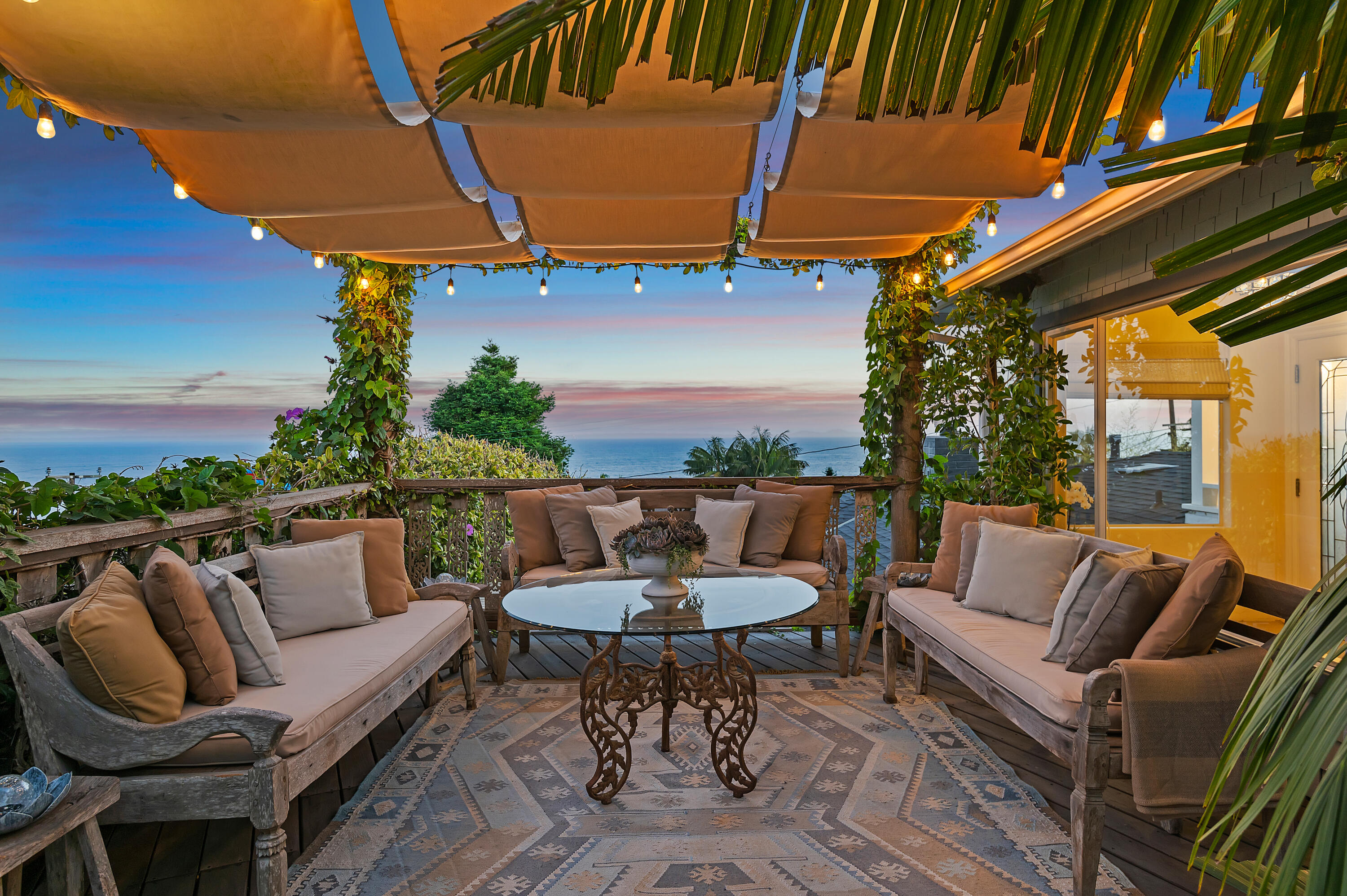 a balcony with furniture and a couch