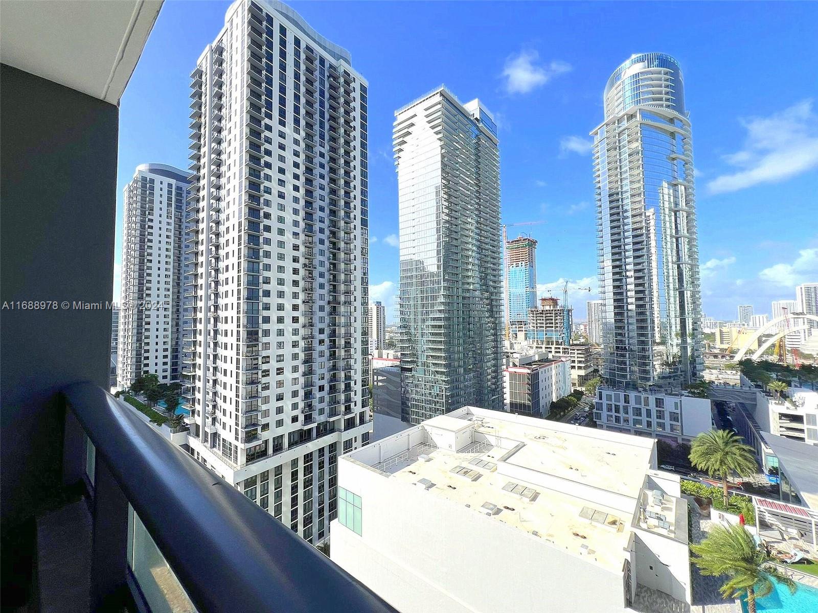 a view of a city from a balcony