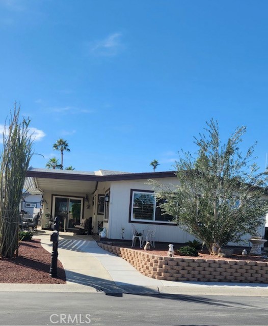 a front view of a house with a porch