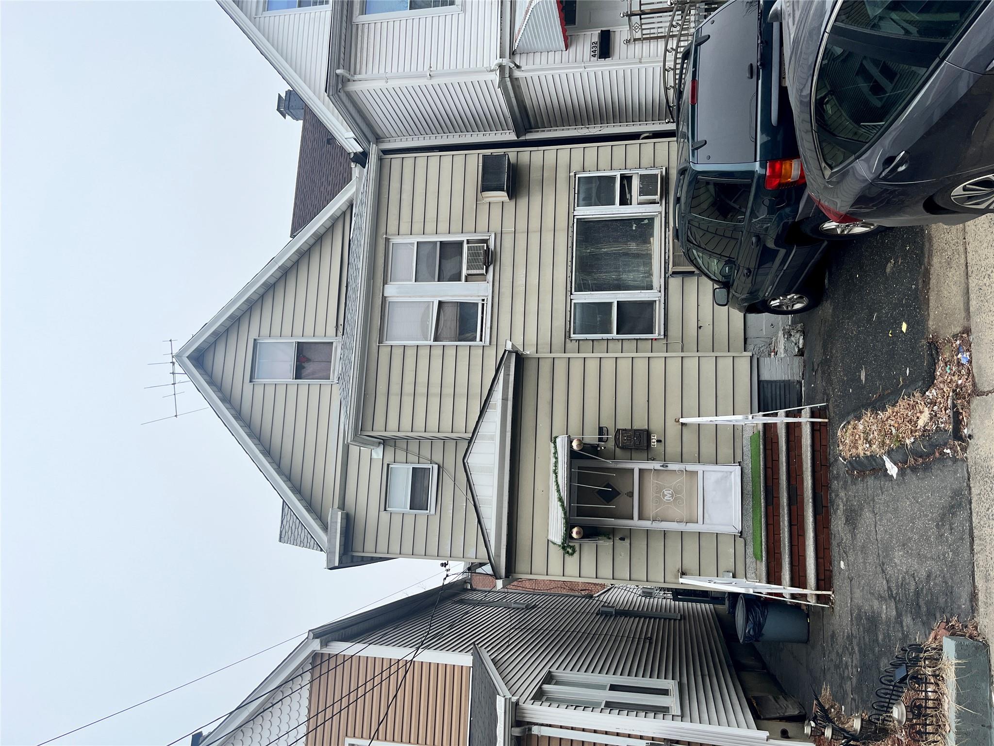 a front view of a house with a garage