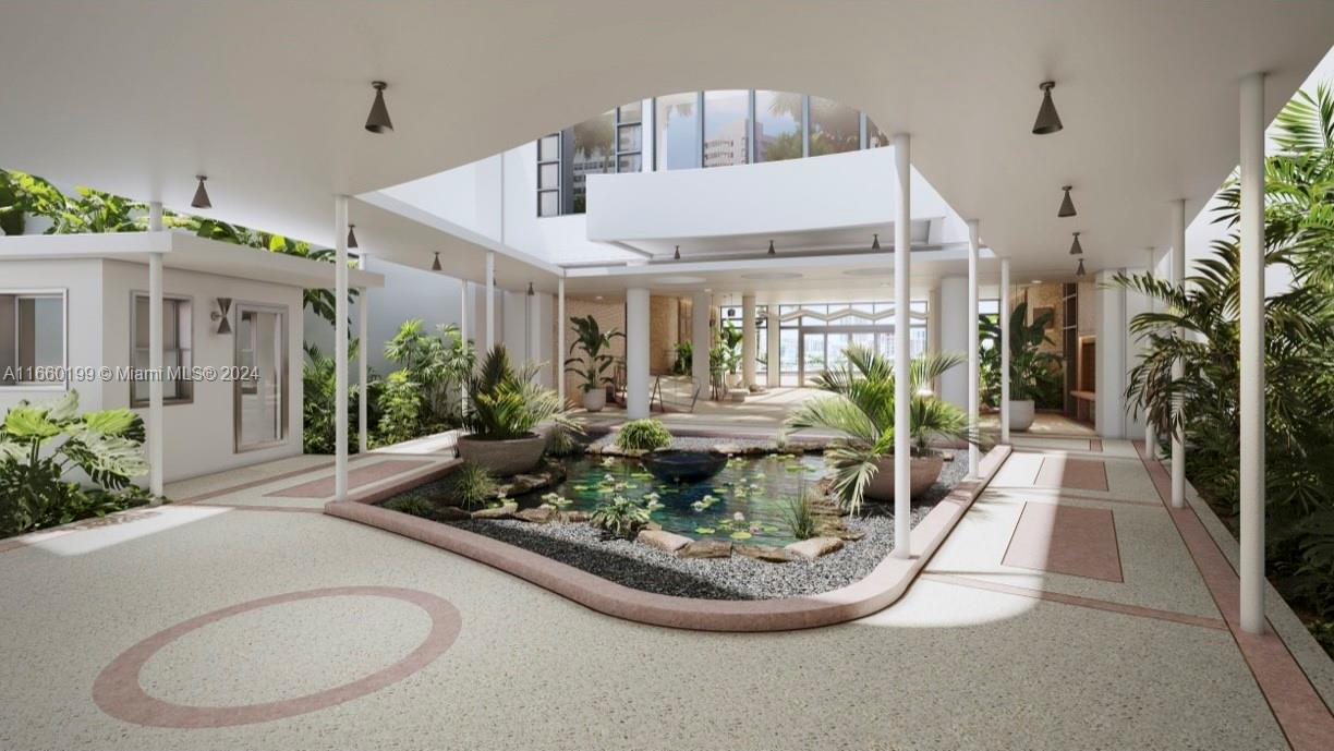 a view of a house with fountain in a patio