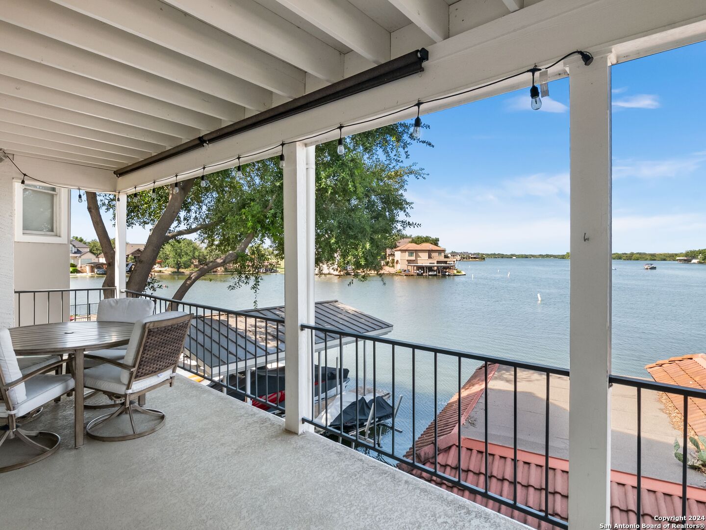 a view of a balcony with chairs