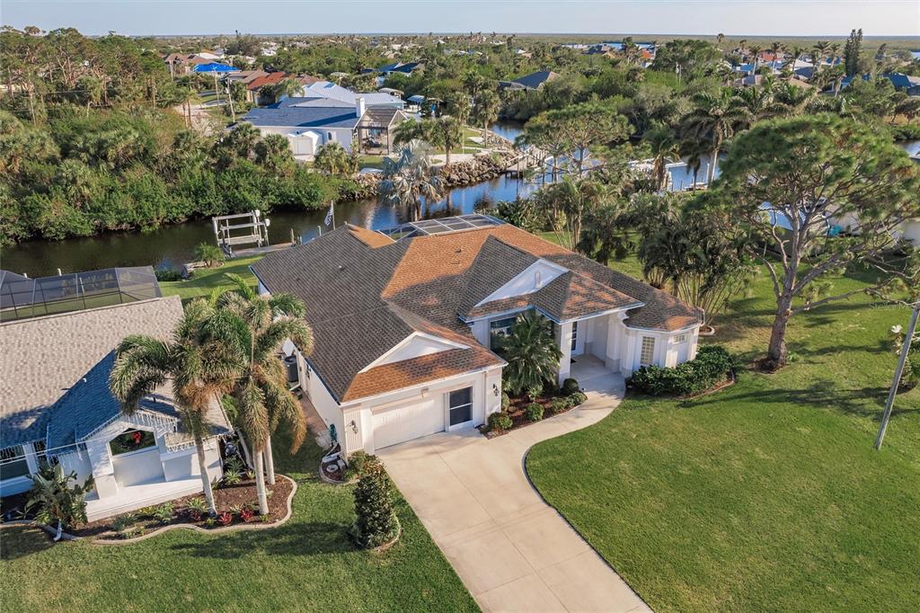 an aerial view of a house with a garden