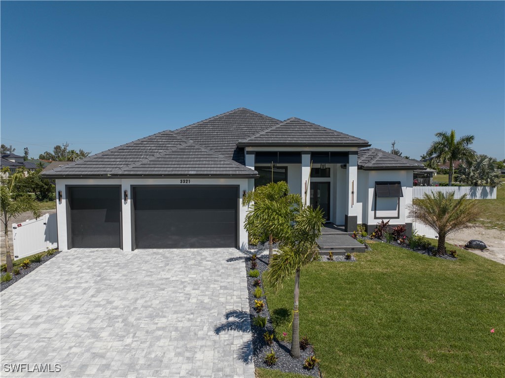 front view of a house with a yard