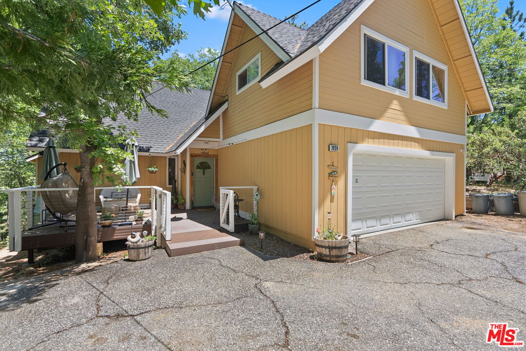 a view of a back yard of the house