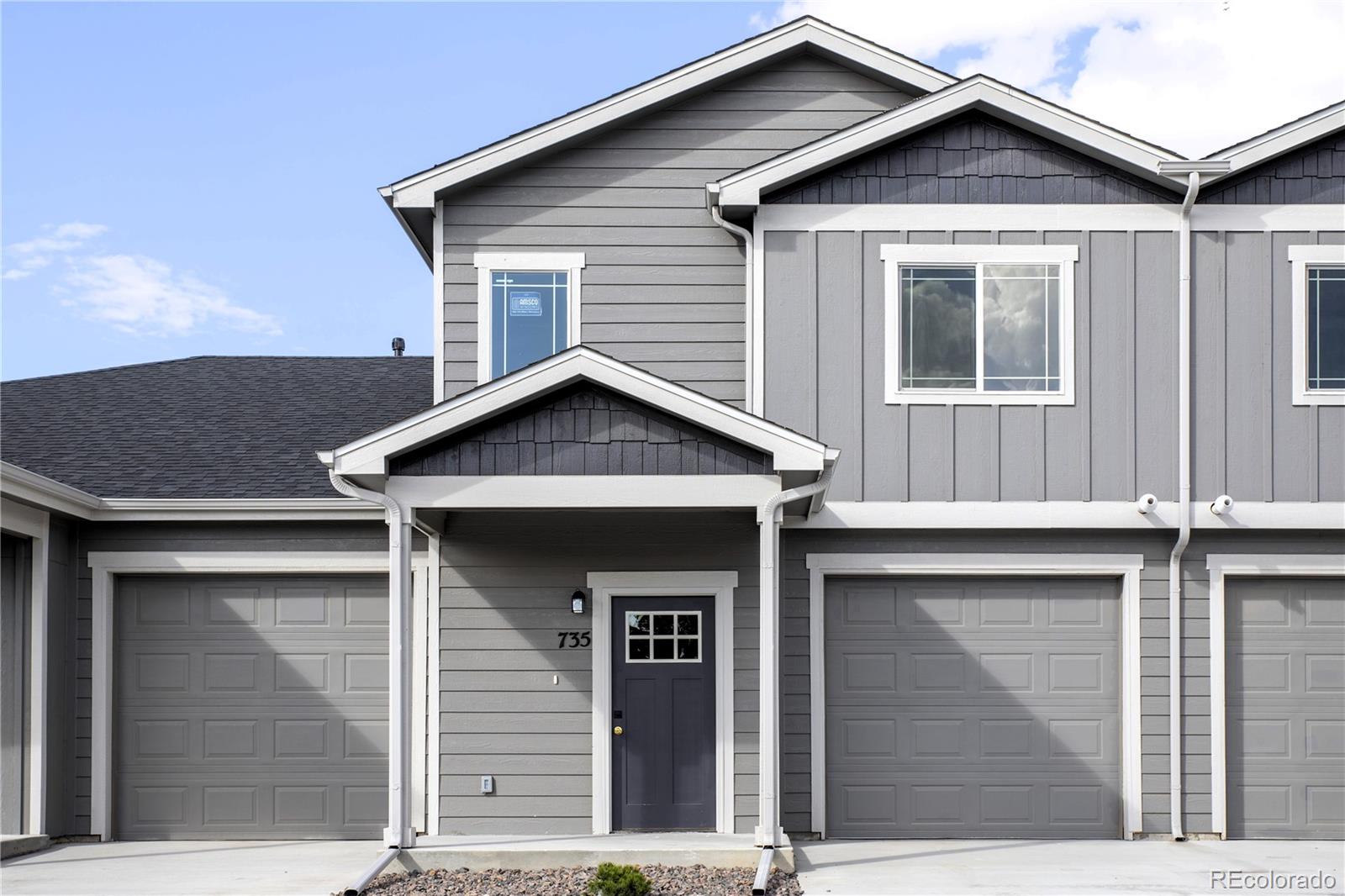 a view of a house with garage