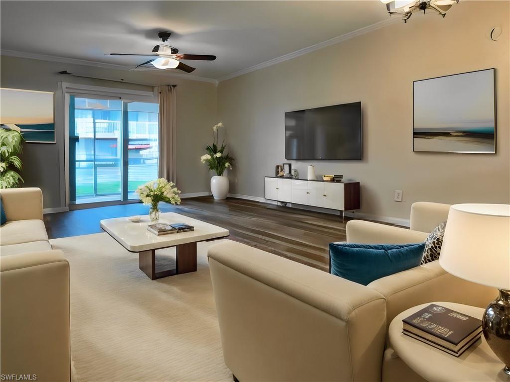 a living room with furniture and a flat screen tv