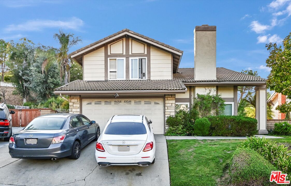 a car parked in front of a house