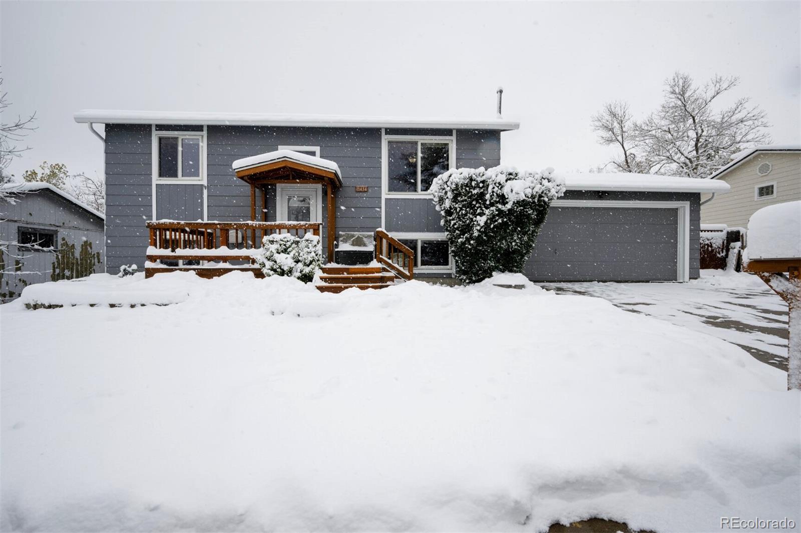 a view of a house with patio outdoor seating area