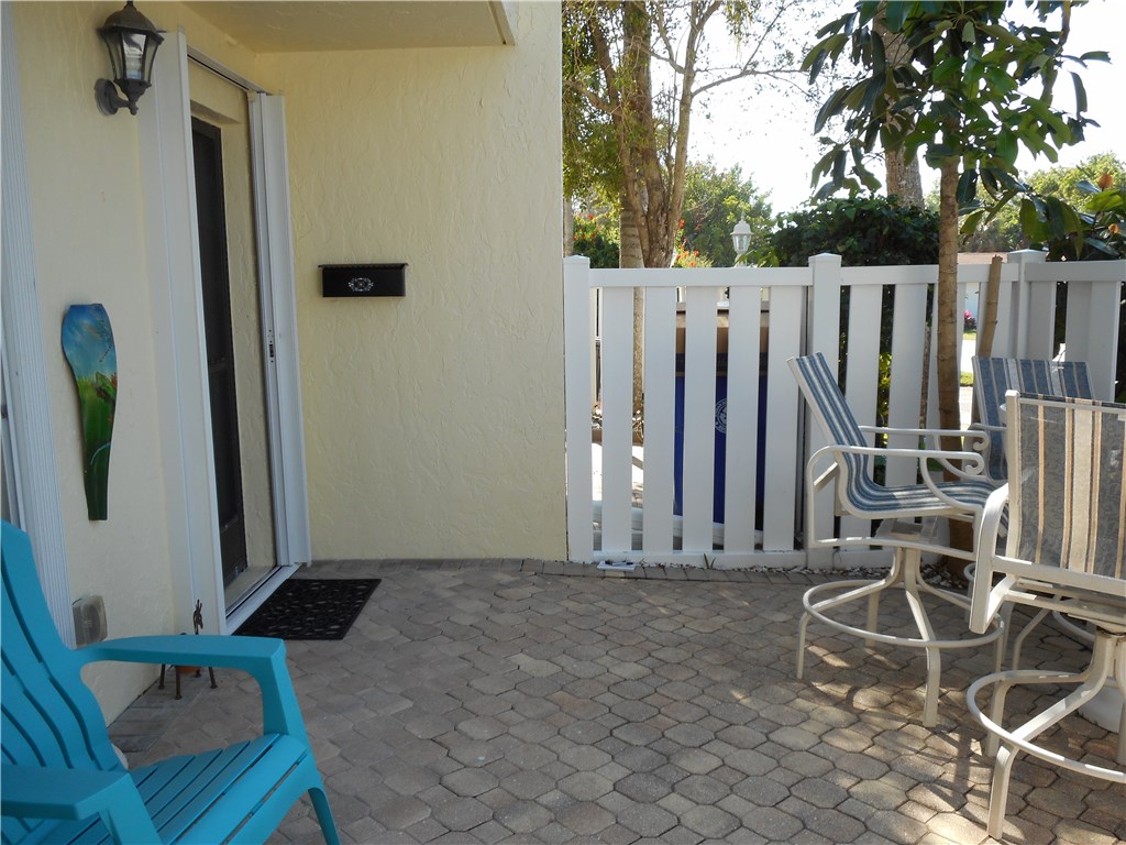 an outdoor space with chairs