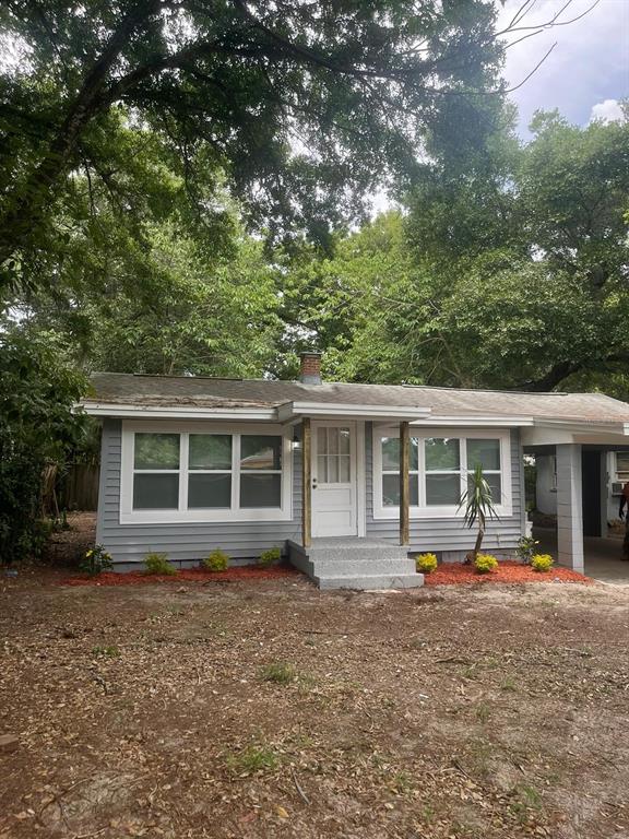 front view of a house with a yard