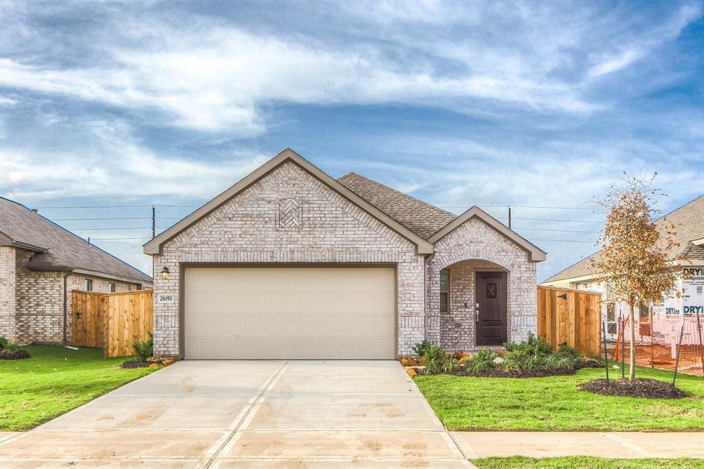 a view of house with yard and entertaining space