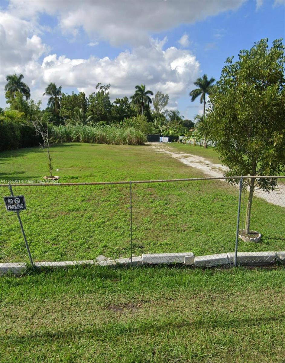 a view of a golf course with a lake