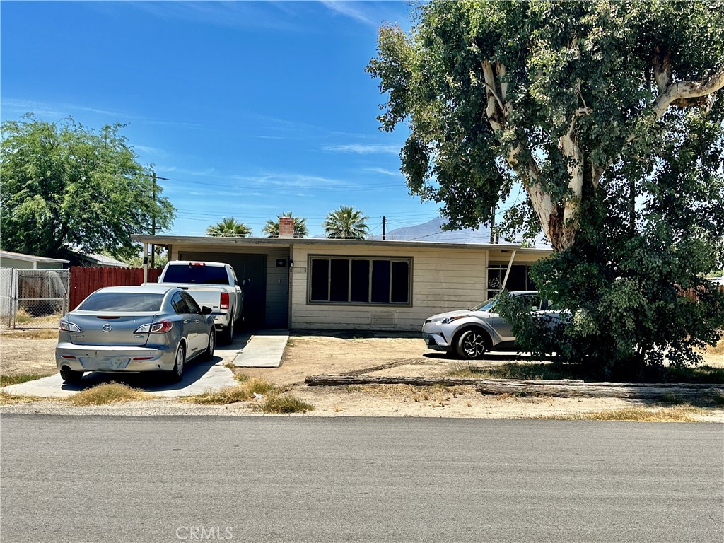 a car parked in front of a house