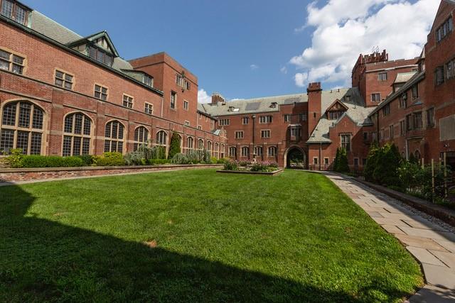 a view of a building with a yard