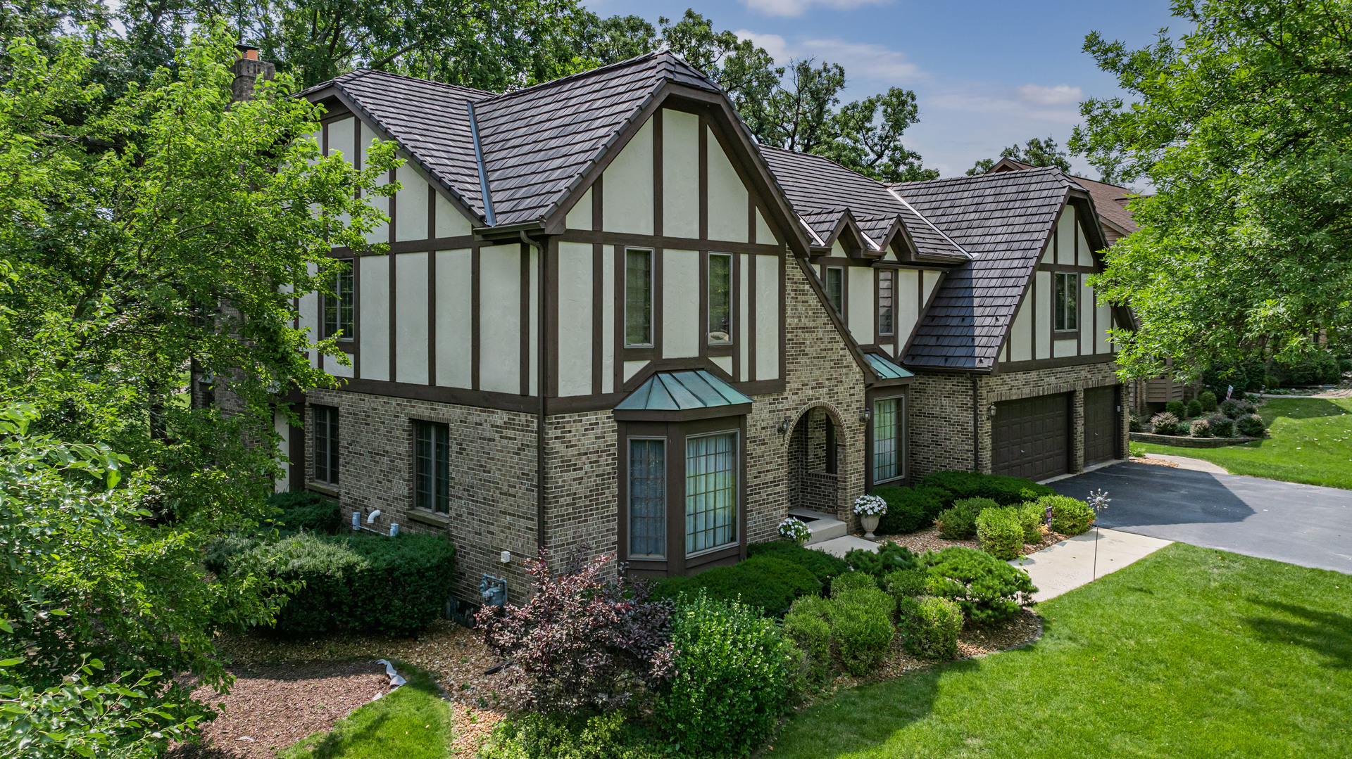 front view of a house with a yard