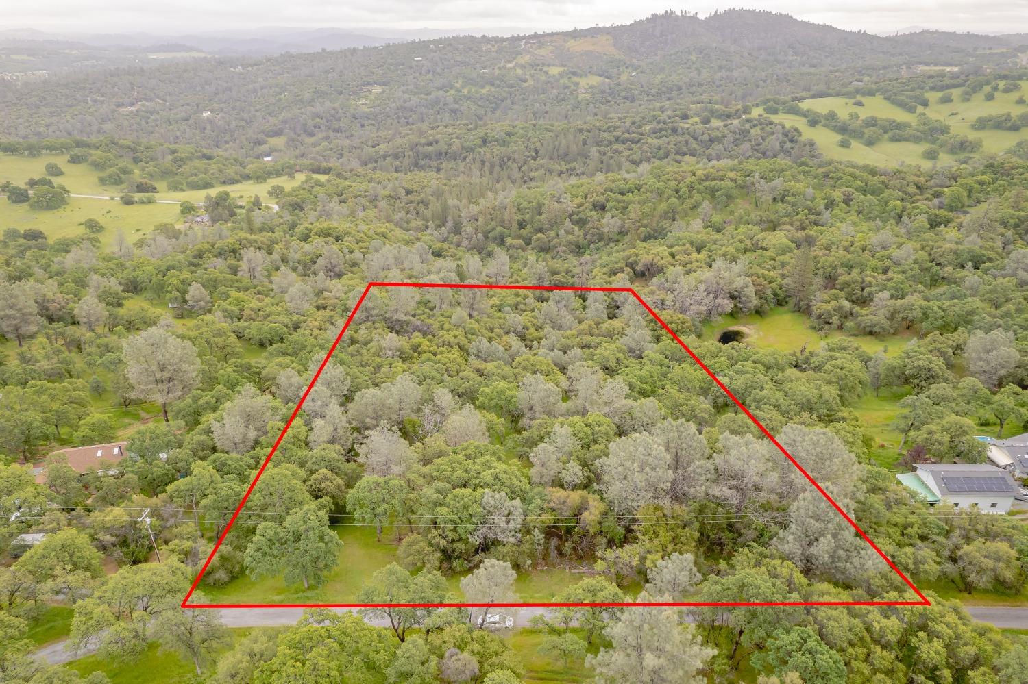 a view of an outdoor space and a mountain view