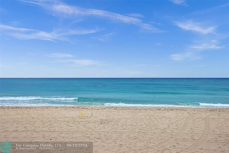 a view of beach and ocean