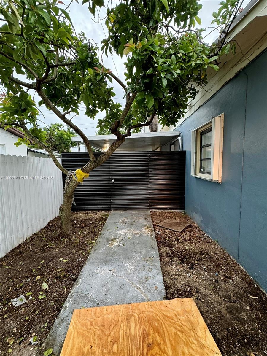 a view of outdoor space and yard