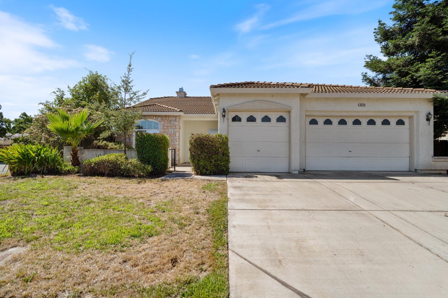 a view of a house with a garage