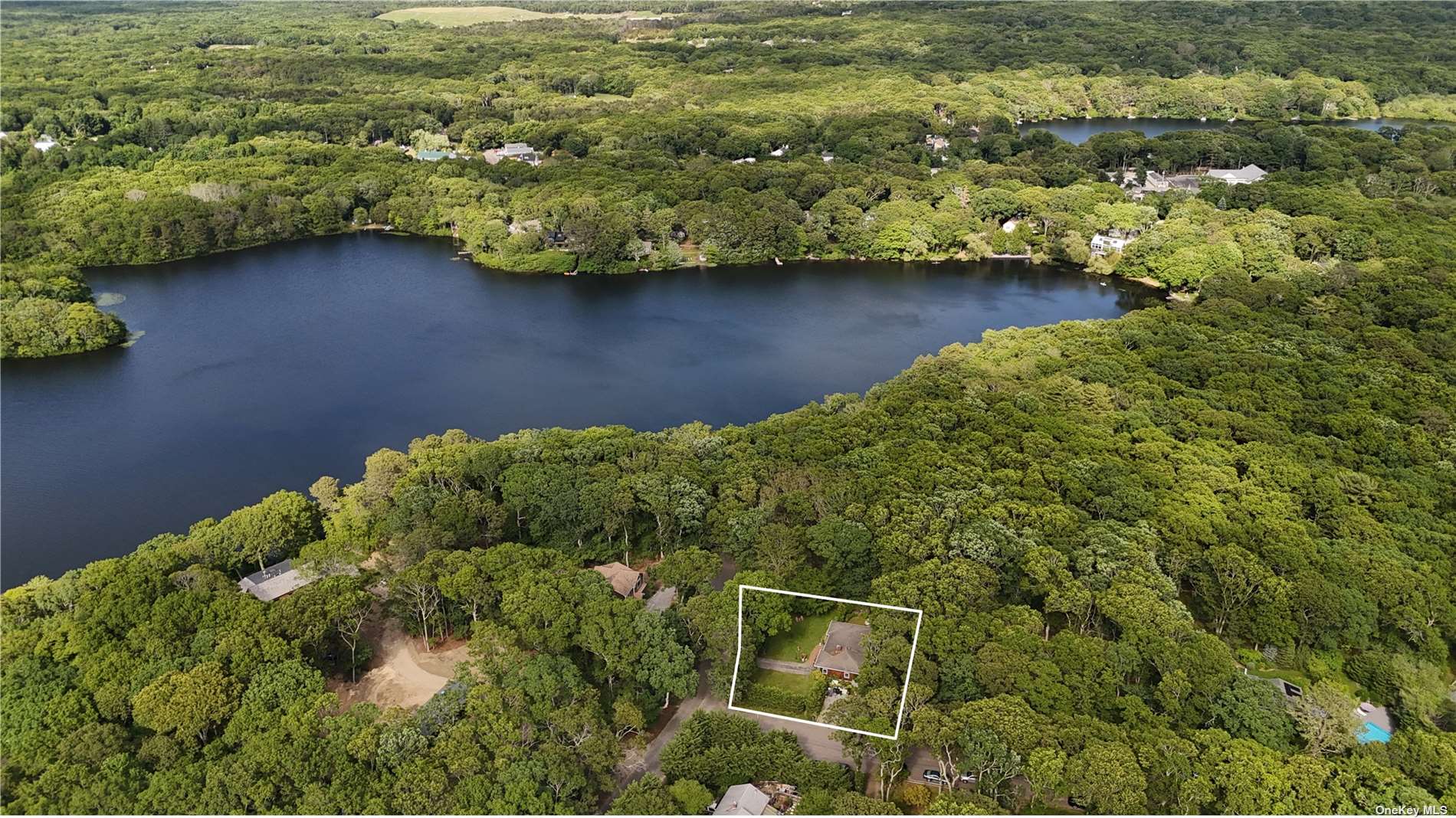 a view of a lake with a house