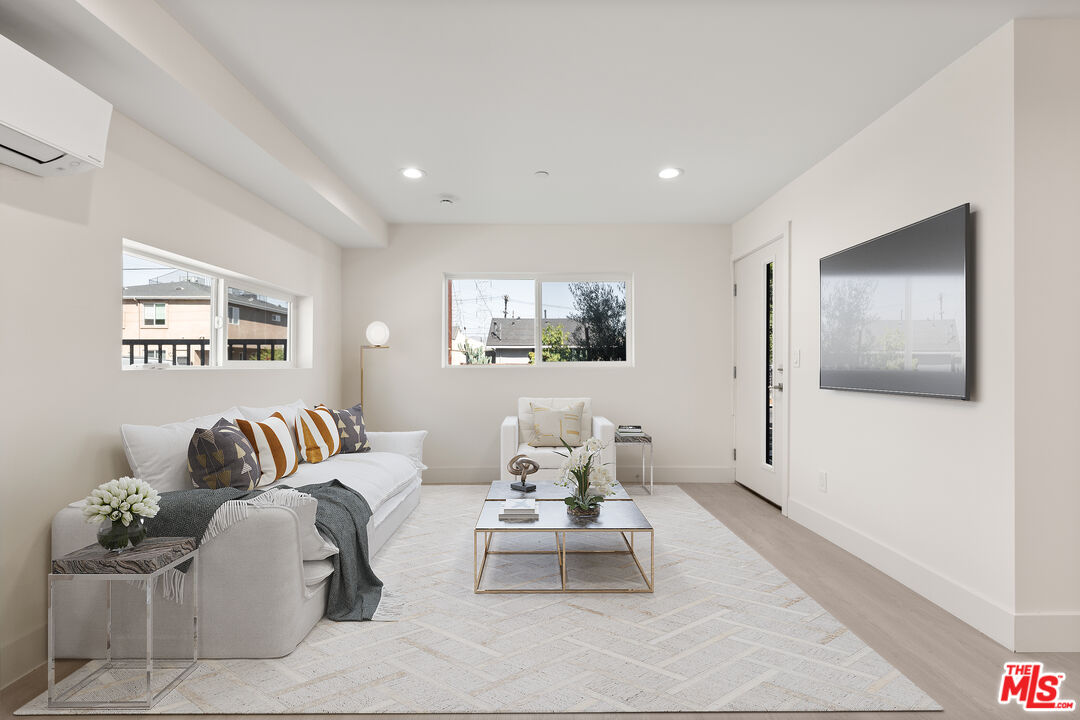 a living room with furniture and a couch