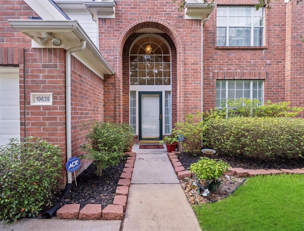 a house view with a garden space