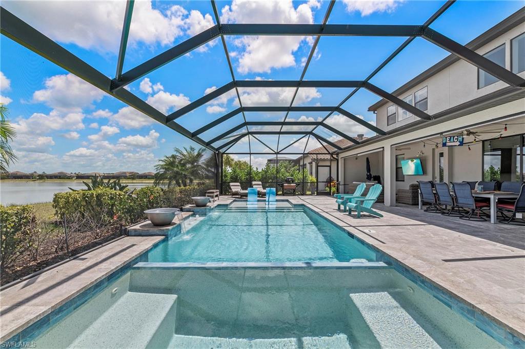 a view of a swimming pool with a patio