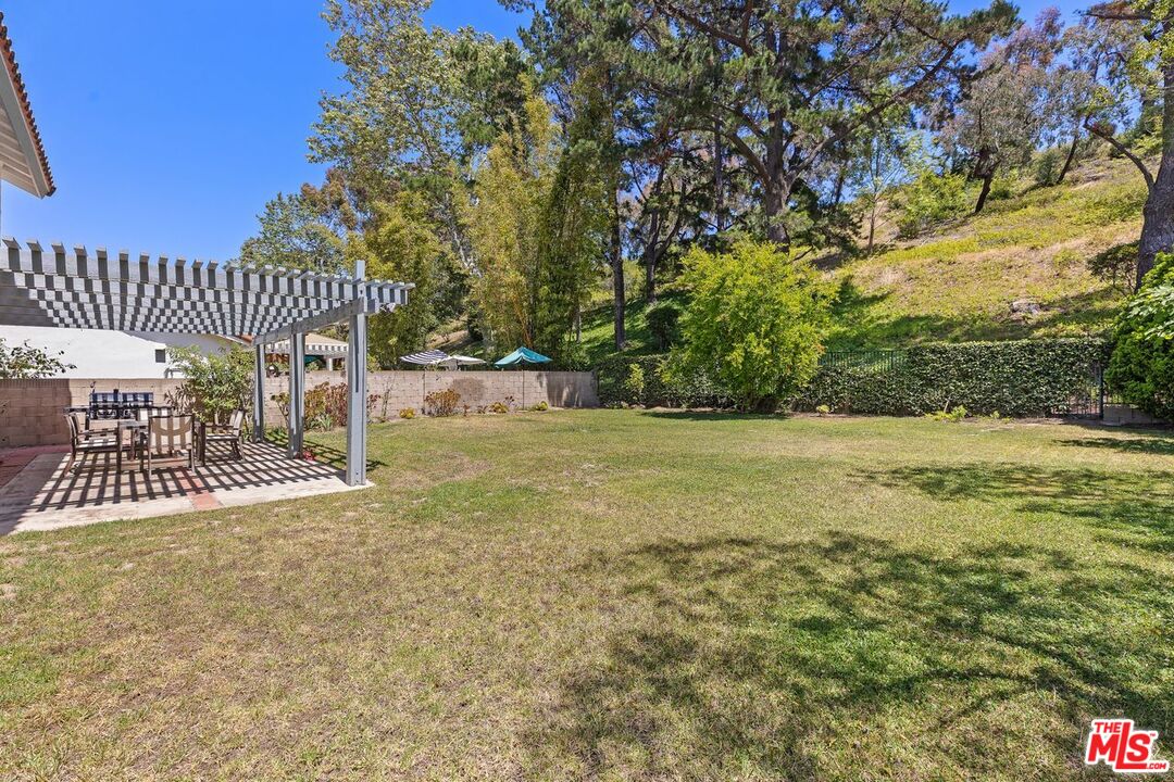 a view of outdoor space and yard