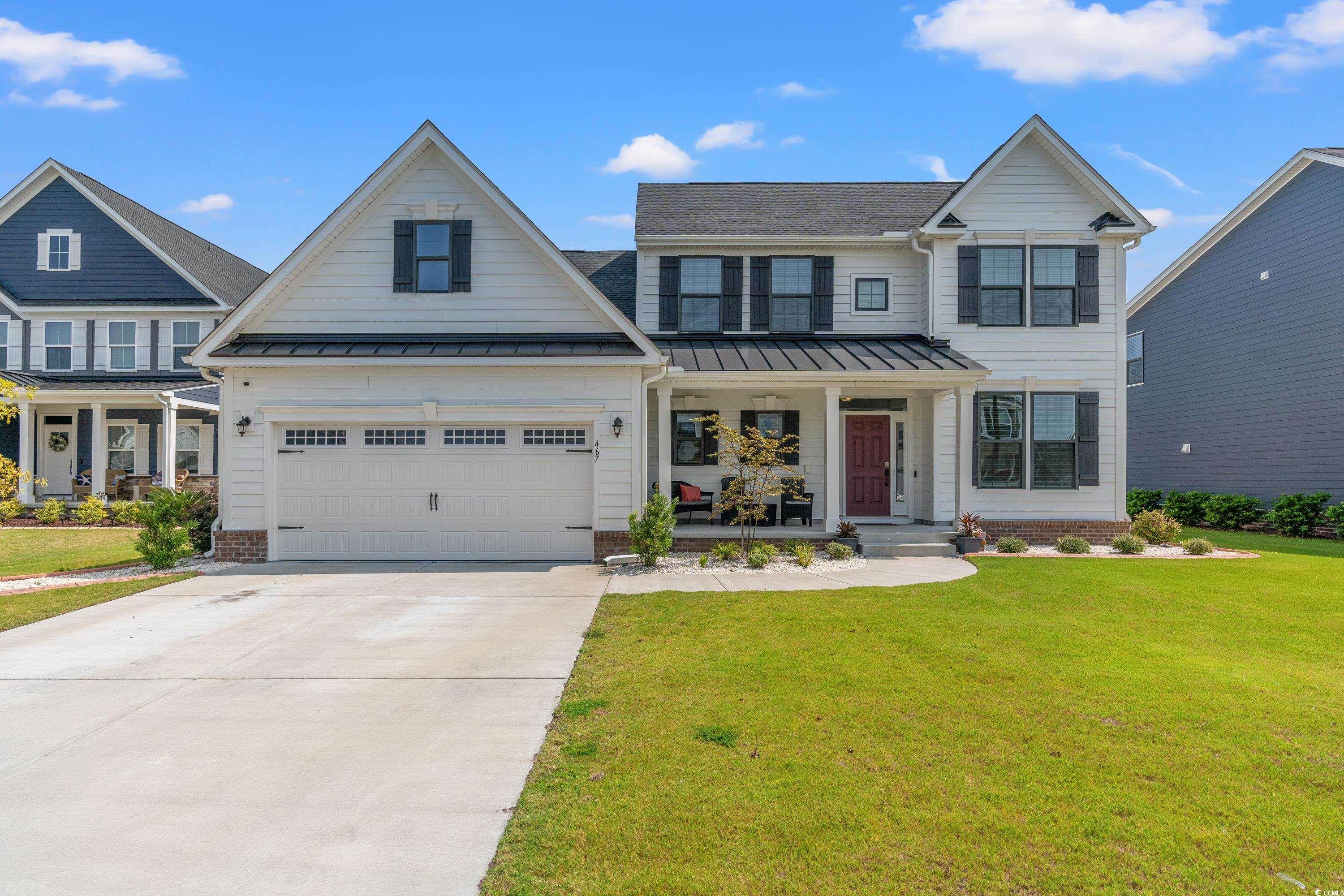 View of front of property with covered porch