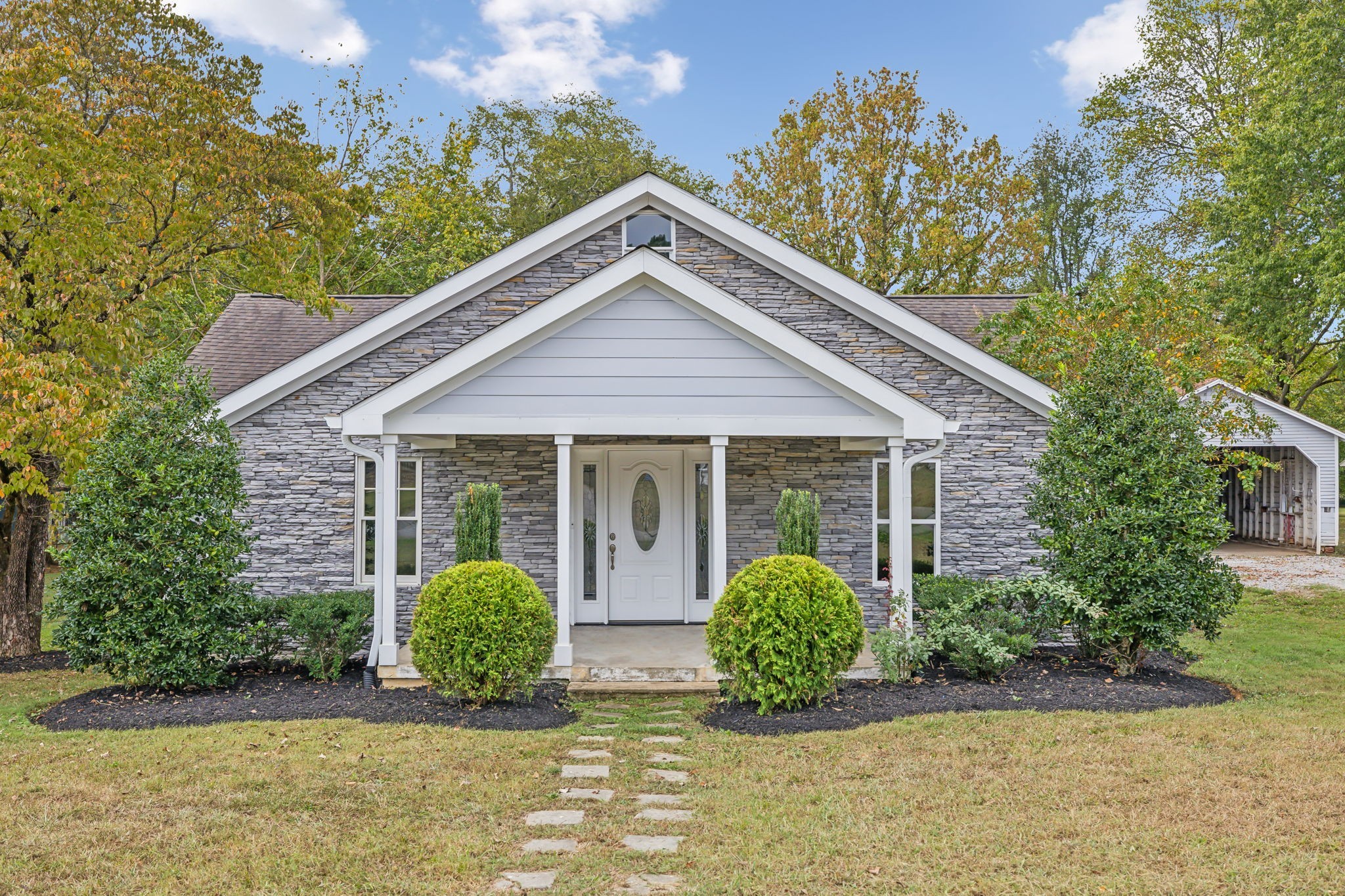 Nestled in the heart of Chapel Hill, just minutes from Henry Horton State Park, this recently remodeled early mid-century beauty is a true gem.