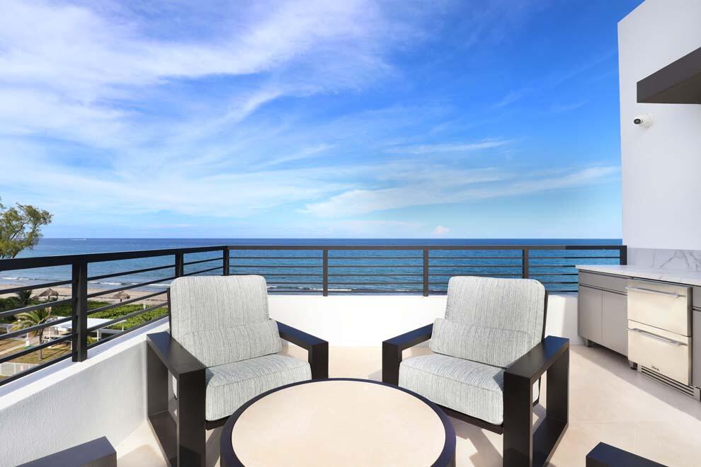 a view of furniture and sitting area