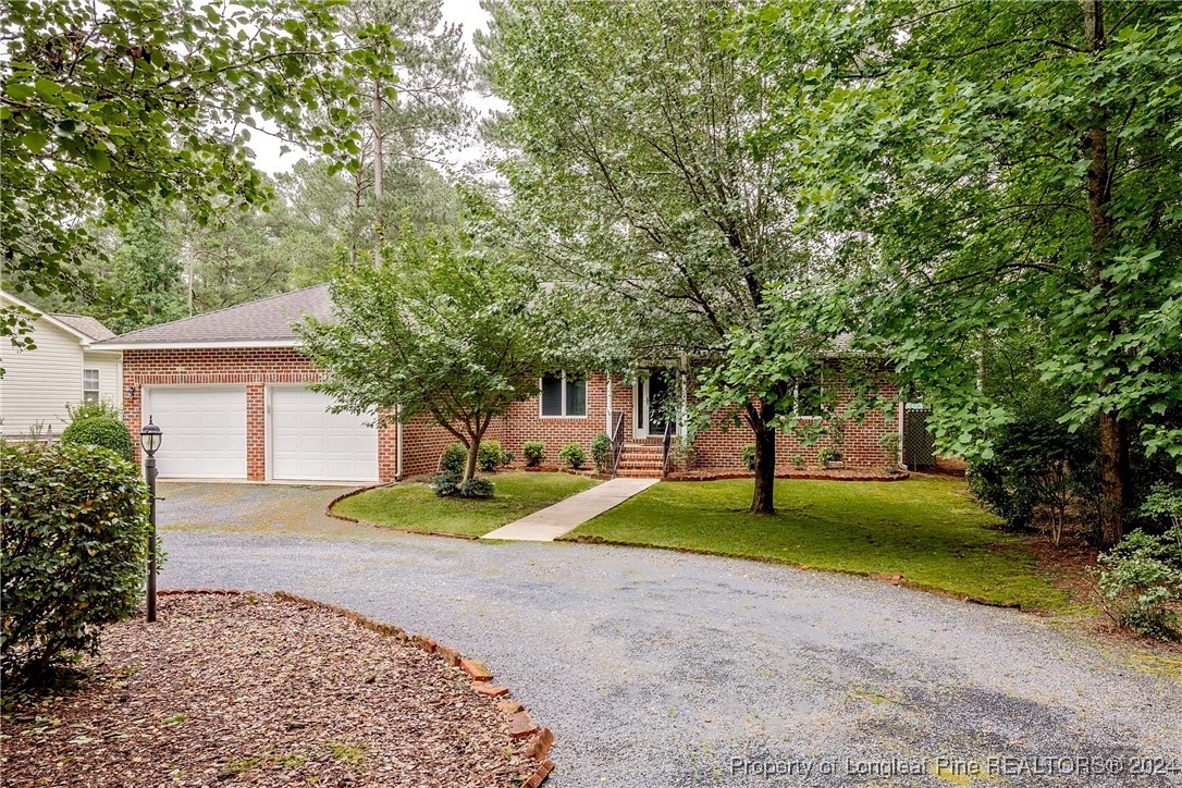 a house with trees in front of it